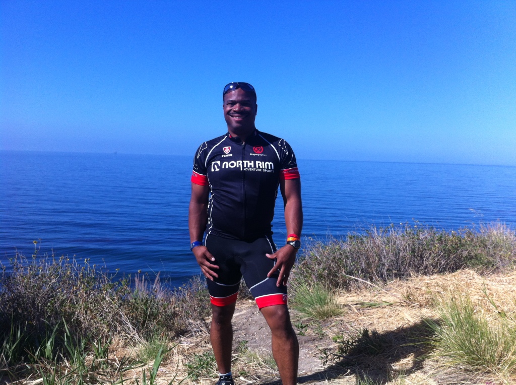 Tray Robinson in front of the Pacific Coastline